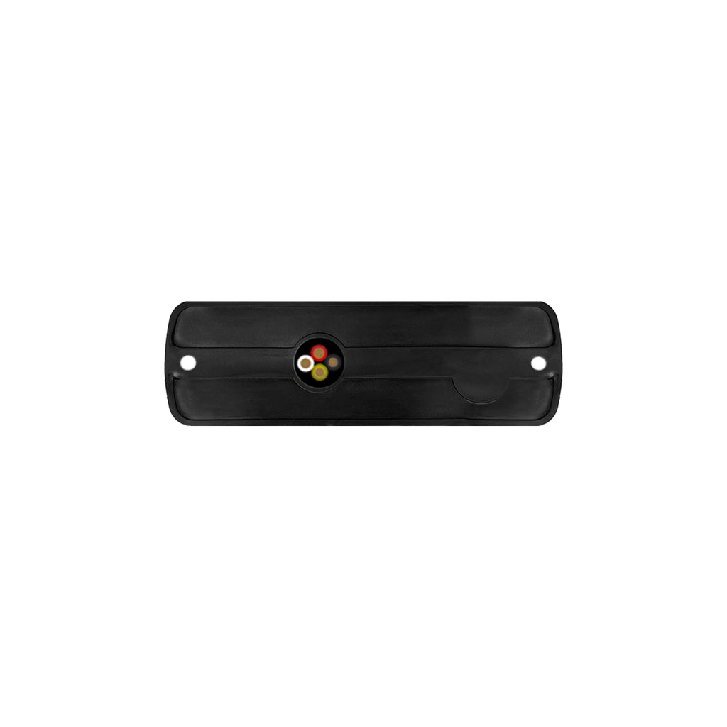 Black rectangular object with a circular design on a white background